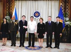Ambassador Gerard Ho Hand Shake with President Duterte